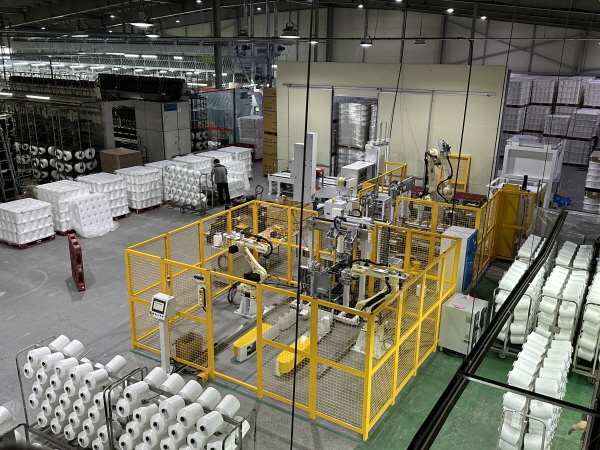 ▲여주티앤씨는원사픽업이송과원사포장팔로우 토토자동화로공장환경을획기적으로바꿨다.